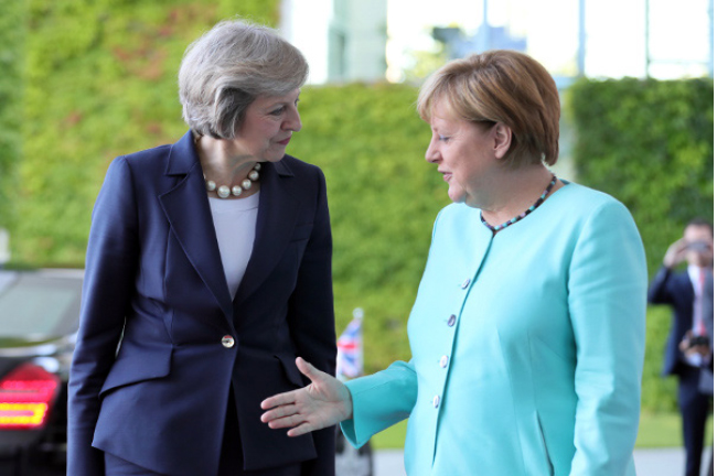 Merkel Welcomes May’s Brexit ‘Clarity’, Vows European Unity